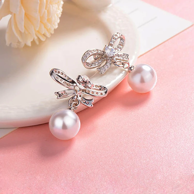 Nowe mody Bowknot 10mm Pearl Drop kolczyki 925 Sterling Silver Rhinestone elegancki wisiorek Ear Stud kobiety biżuteria prezent urodzinowy