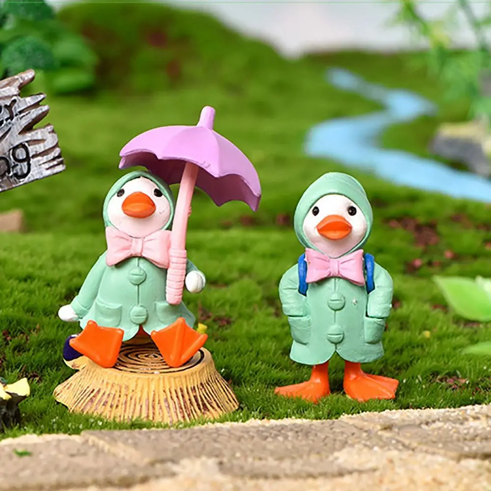 4 sztuk/zestaw parasol płaszcz przeciwdeszczowy Cute Cartoon kaczka miniaturowa figurka ozdoby żółte kaczki figurka dla miniaturowy wystrój ogrodu