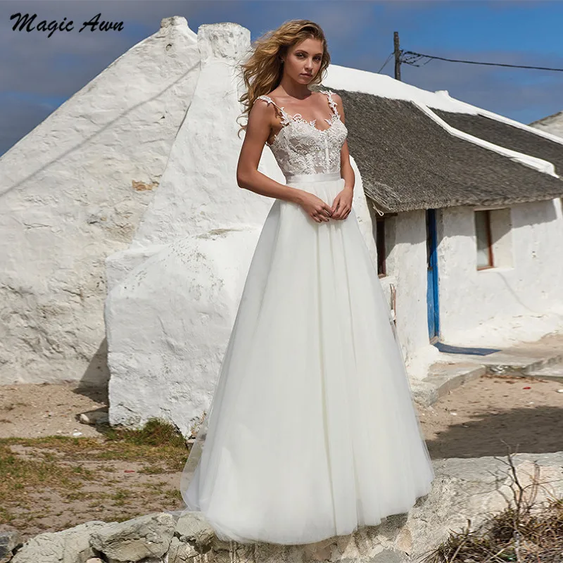 Magic Awn Romantic Beach Wedding Dresses 2021 Lace Appliques Spaghetti Straps Illusion A-Line Bohemian Bridal Gown Vestido Novia