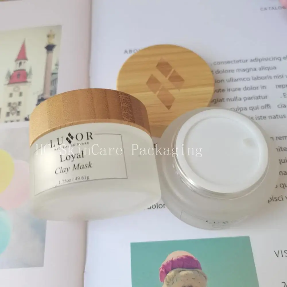 

Wholesale Cosmetic Cream Jar With Bamboo Wood Lid Frosted Clear Glass Container Skin Care Packaging Jars 200g 100g 50g 30g