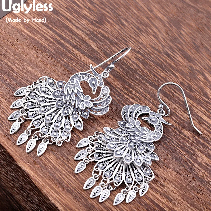 

Uglyless Thai Silver Vintage Ethnic Peacock Earrings for Women Filigreed Animals Phoenix Earrings Real 990 Silver Brincos E1440