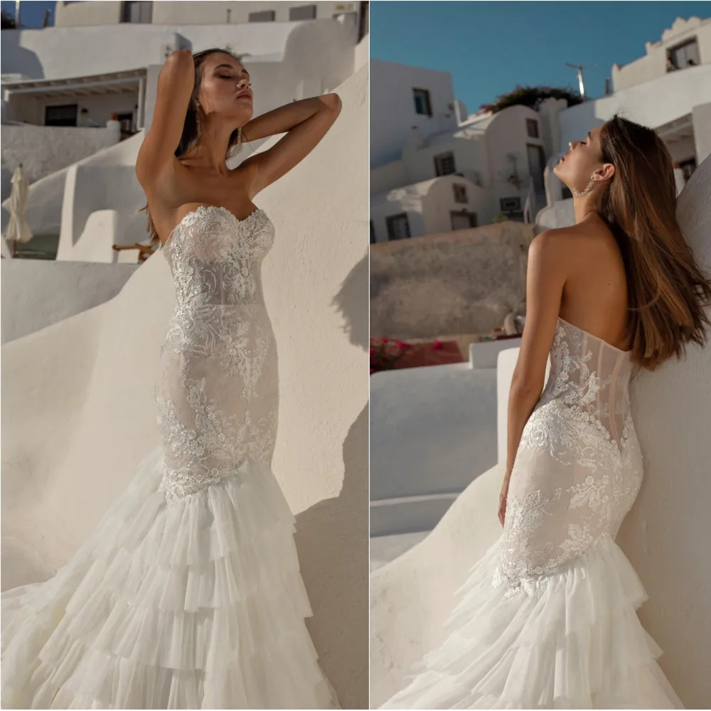 

2020 Mermaid Wedding Dresses Sweetheart Sleeveless Lace Appliques Tiered Bridal Gowns Open Back Sweep Train Wedding Dress