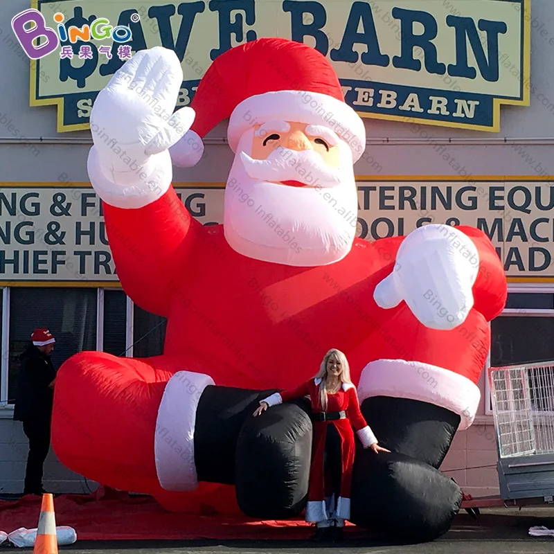 Christmas Decoration Inflatable Sitting Santa Claus For Sale / Outdoor 5mH Waving Xmas Old Man With Customized Logo Toys