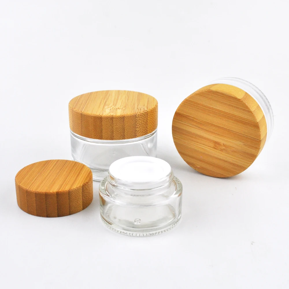 

Bamboo cosmetic container bamboo jar clear glass jar with bamboo lid Cosmetic 50g frosted glass jar with bamboo lids 30ml 50ml