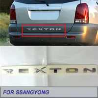 Emblema del logotipo de la puerta trasera del maletero genuino para Ssangyong REXTON 2006-2012 insignia del logotipo de la tapa del maletero trasero 7991008020   Señal del parachoques trasero