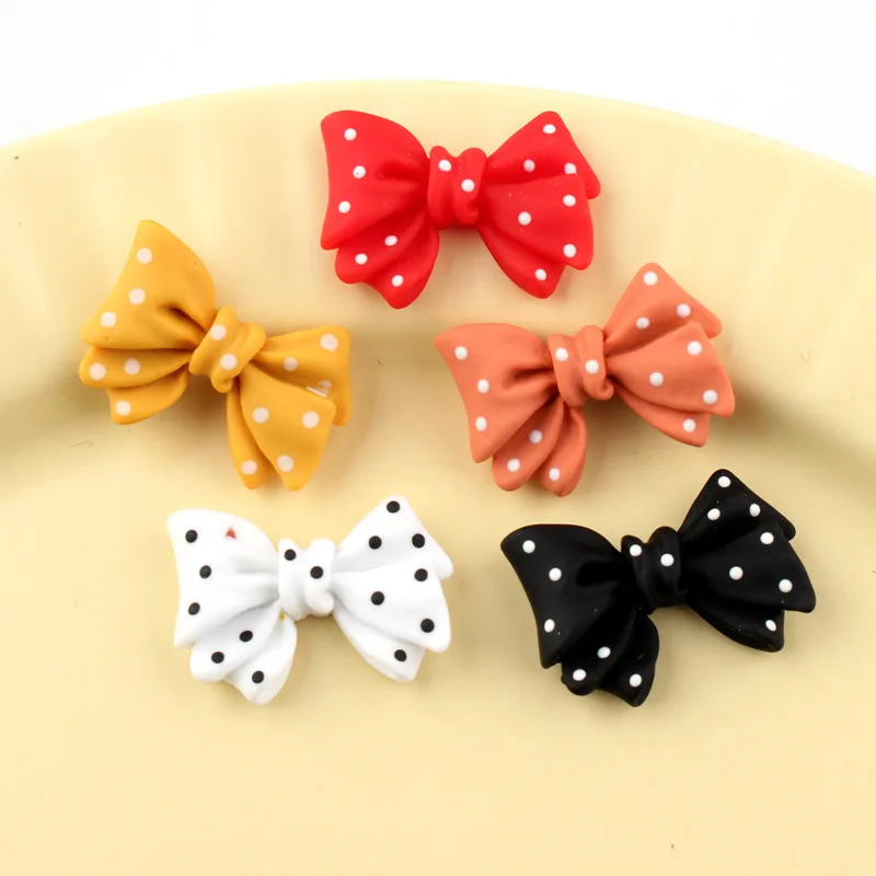 

Free Shipping 100pcs 28*19mm Polka Dots Ribbon Knot Tie Bow Resin Cabochons Embellishments Scrapbooking Hair Bow Center Decor