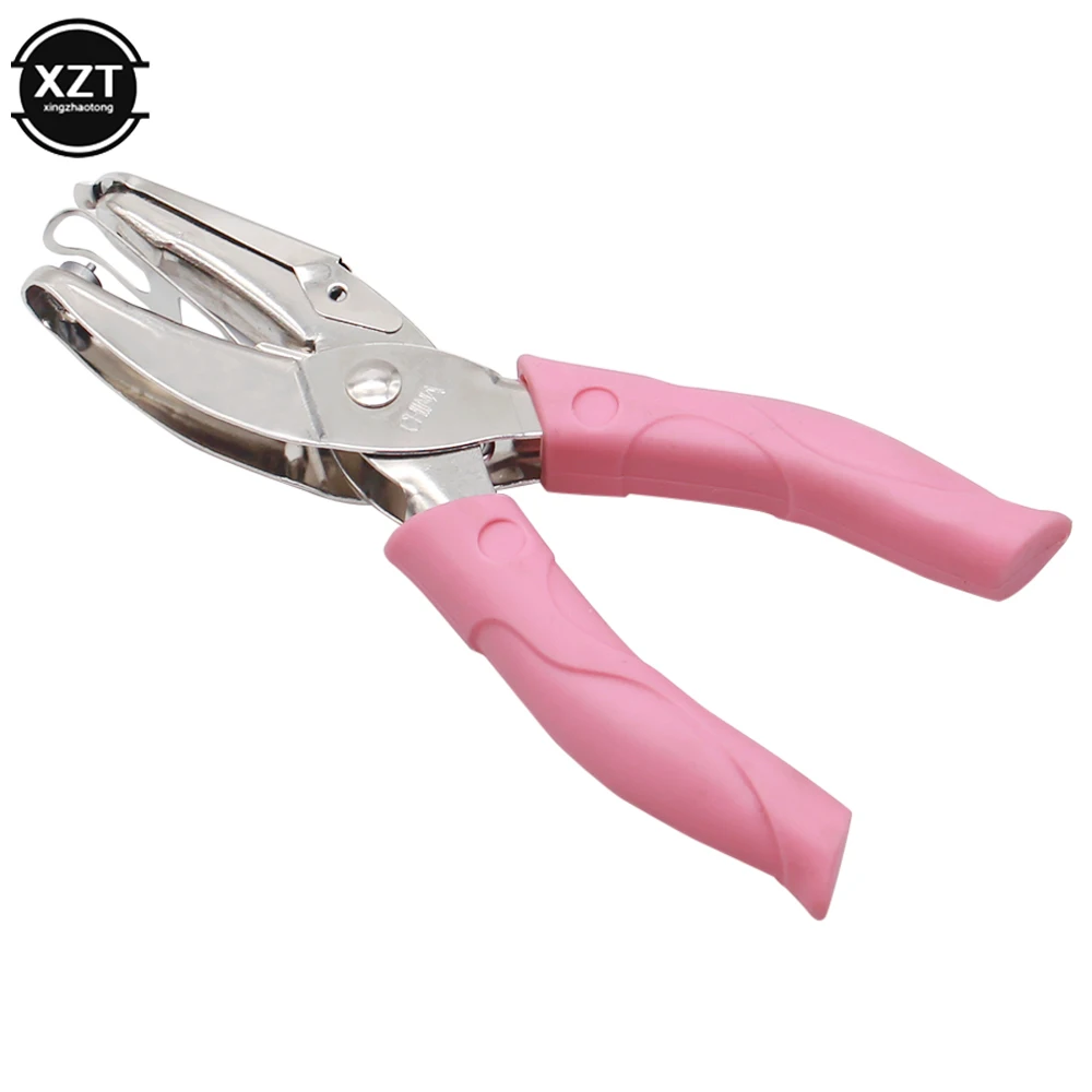 Рисунок 5 - Дырокол с ручкой 1