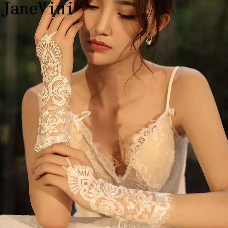 JaneVini White Sequins See Through Wedding Gloves Women Short Wrist Length Lace Bridal Gloves Bride gants courts mariage 2020