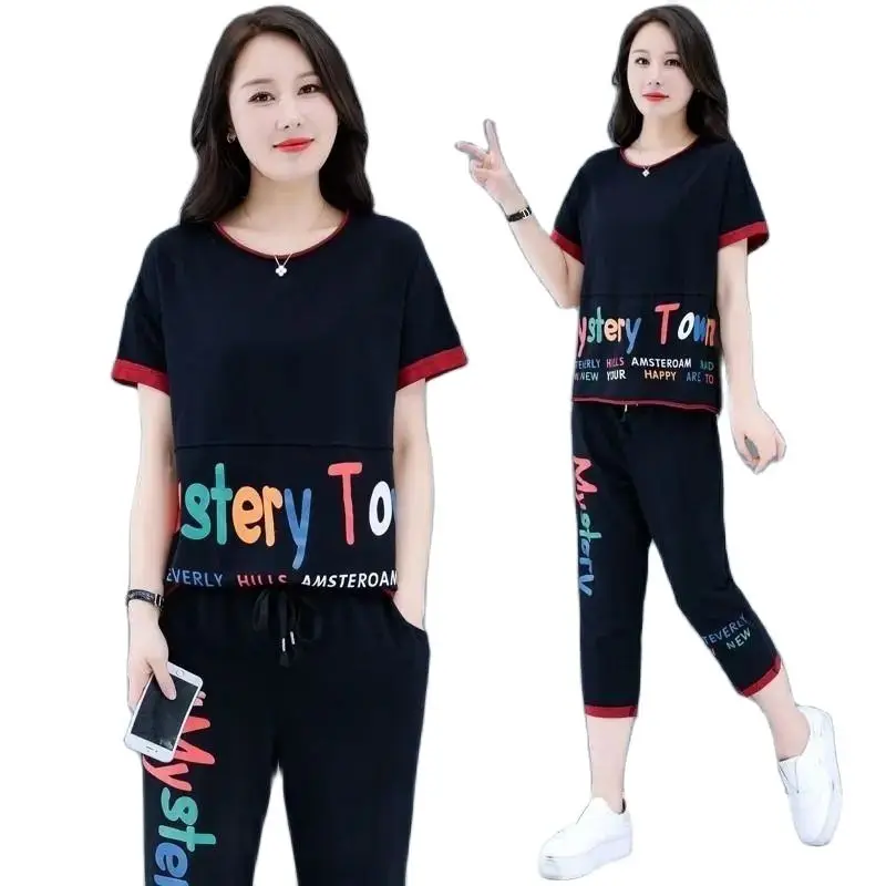 Fashion Women's Two-Piece 2024 Summer New Loose Stamped Letters Short Sleeve Top+ Harlan Cropped Trousers Female Casual Suit