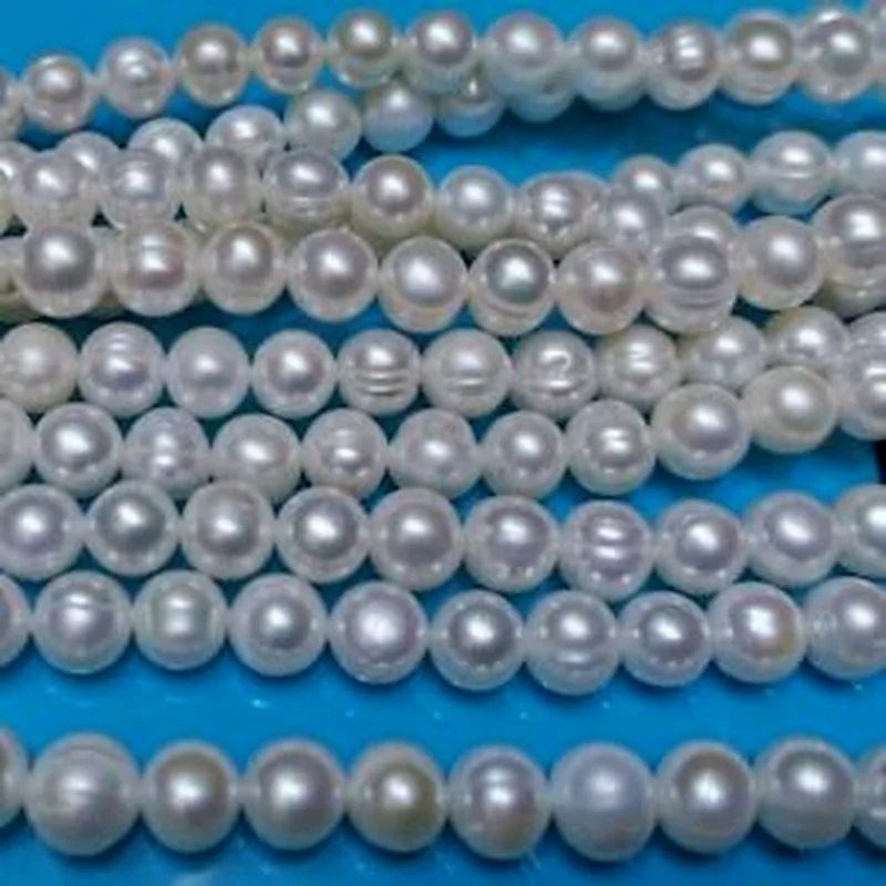 

Wholesale 10 strands 7-8mm whitel freshwater pearl near round beads 13.5"