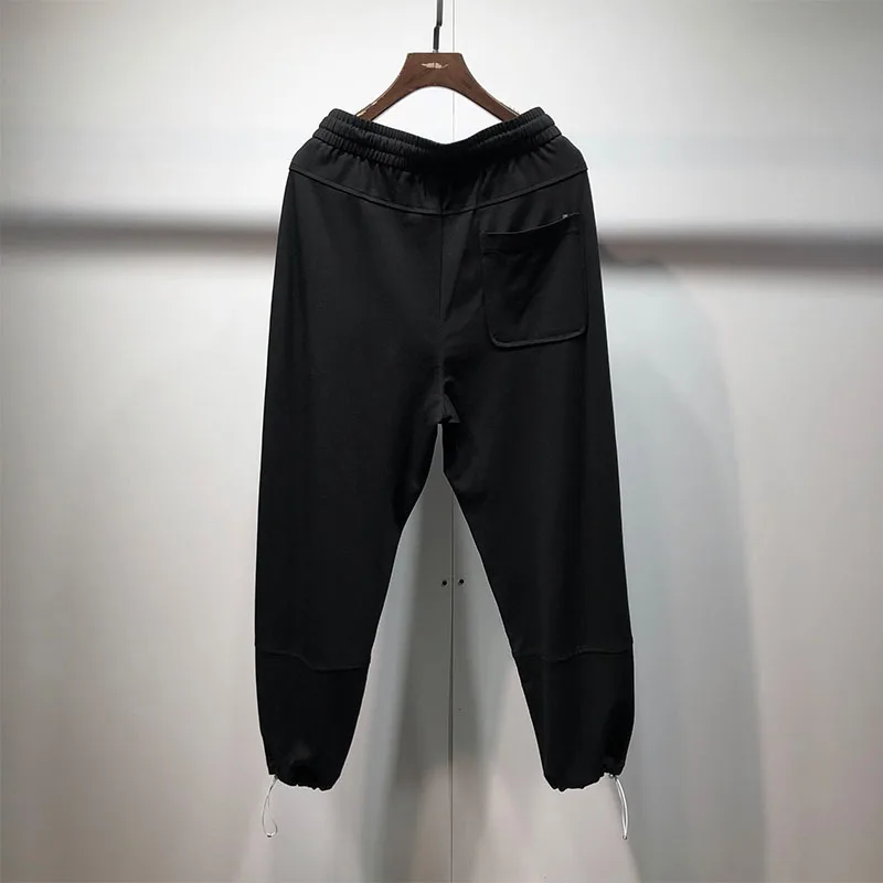 Simple pure color thin men's leggings for spring and summer show slim straight pants, leg tie pants, slimming sports pants and e