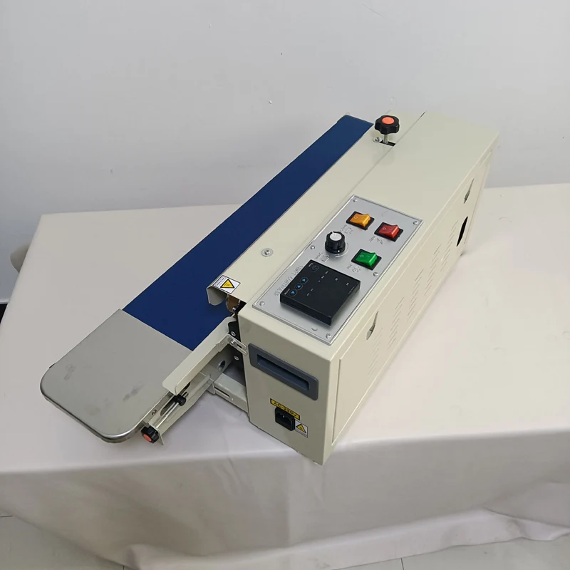 آلة ختم شريط الأكياس البلاستيكية الأفقية المستمرة الأوتوماتيكية