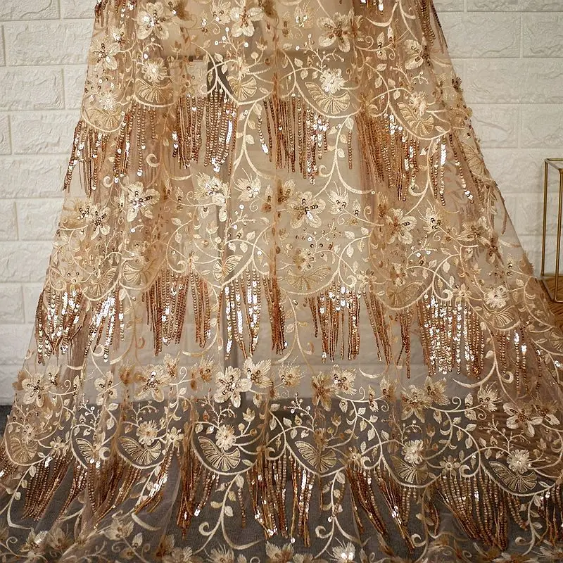 High-grade champagne gold mesh lace embroidery fabric Fringed sequins embroidered lace fabric Dress costume fabric