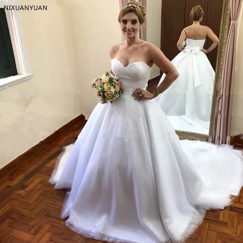 

Sweetheart Ball Gown Princess Wedding Dresses Bling Bling Tulle with Bow Belt Bridal Dress Vestido De Noiva Robe De Mariee