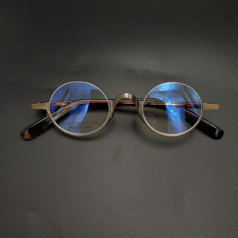 Gafas redondas pequeñas de metal de titanio para hombres y mujeres, montura óptica retro ovalada, montura inferior media, miopía, Vintage japonés