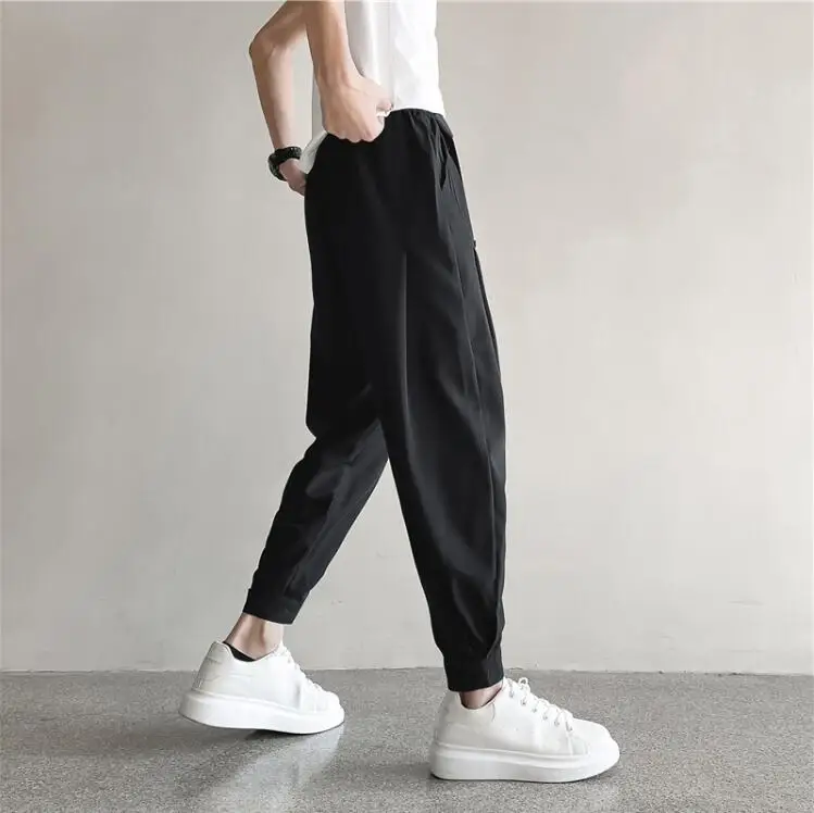 Pantaloni da uomo nuovi pantaloni da jogging leggeri Casual Streetwear sensazione di freddo pantaloni da casa comodi uomo