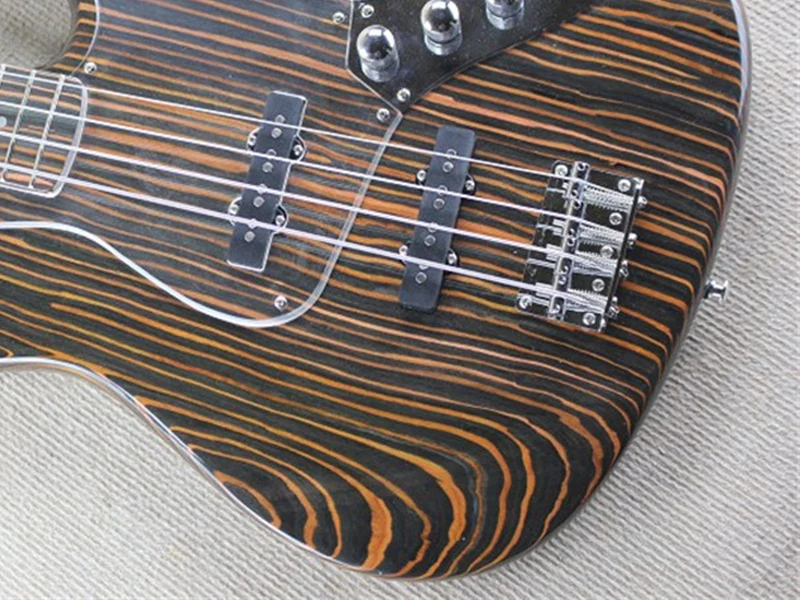 custom 4 string bass guitar, zebra pinto wood body,HH pickups,acrylic pickguard,chrome button,neck bolt on body