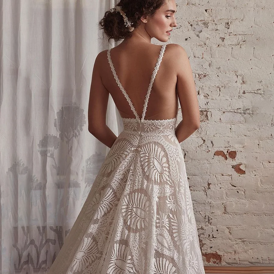 Abito da sposa in pizzo con spalline sottili con manica lunga Bolero Backless su misura scollo A V destinazione una linea abito da sposa romantico