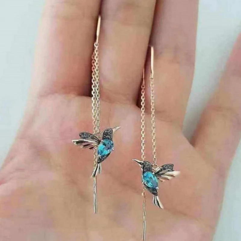 Boucles d'oreilles colibri élégantes pour femmes, boucles d'oreilles pendantes, longs glands en cristal, boucles d'oreilles design unique, bijoux fantaisie pour dames