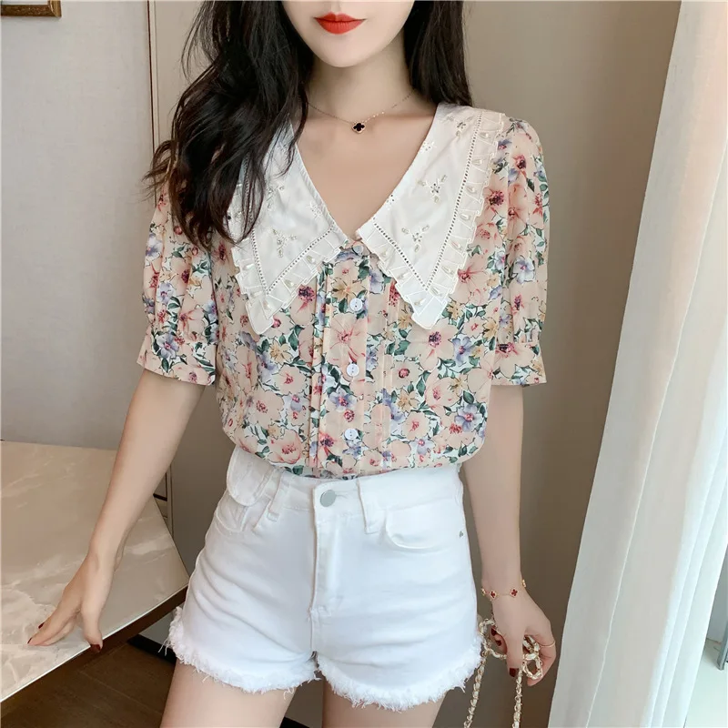 Phụ Nữ Áo Kiểu Mới 2020 Búp Bê Cổ Hoa Phồng Nữ Tay Ngắn Áo Sơ Mi Voan Crop Tops In Hoa Khâu Áo Sơ Mi Nữ Blusas