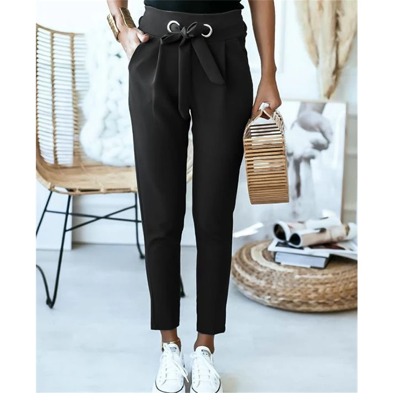 High-waisted solid color pencil pants with bandage design, pockets, and slimming effect for summer streetwear