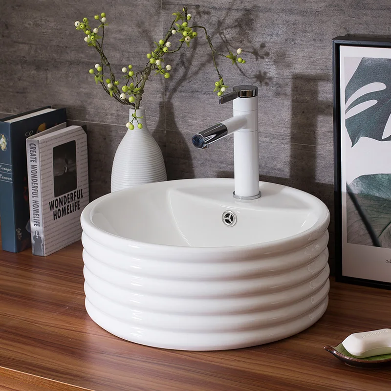 

China Artistic Handmade Ceramic wash basin Round Counter top countertop round white ceramic wash basin bathroom sinks