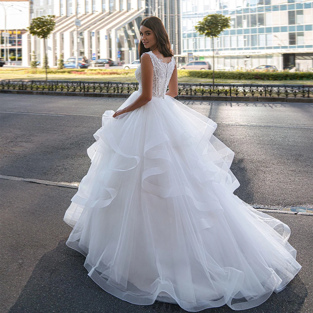 Customized Ball Gown Wedding Dress Sleeveless V Neck Ruffles Tulle Sweep Train Bridal Dresses Beading Applique Robe De Mariee