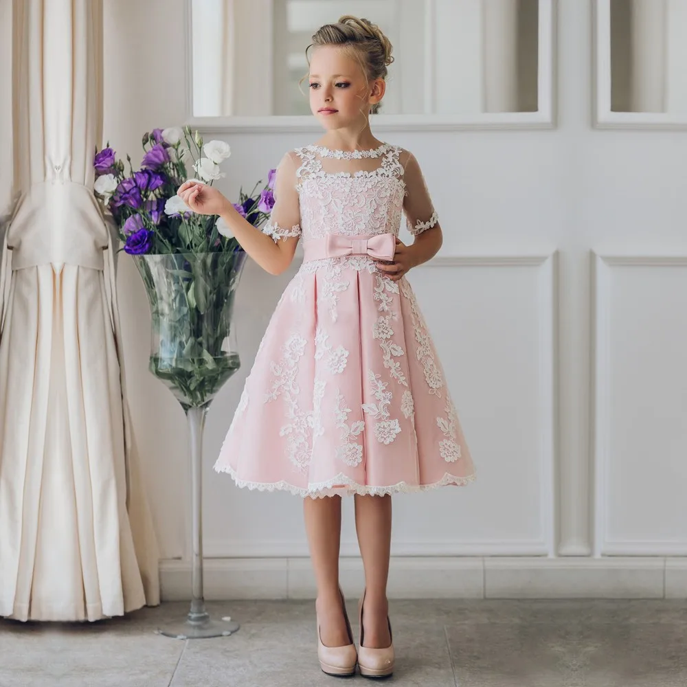 Abiti da ragazza di fiori eleganti abiti da spettacolo per bambini a cascata senza maniche con applicazioni in pizzo Champagne per matrimoni abiti da prima comunione