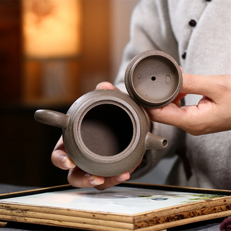 ball shaped infuser holes true yixing zisha original ore qinghui duan clay marked tea pot Chinese character carved pot of tea