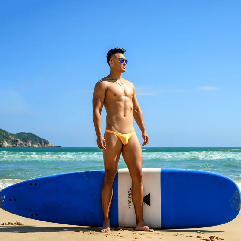 Sexy bright yellow men swimwear bikinis hot pouch gay men swim trunks briefs man tight ultra low waist half pack hip swimsuits