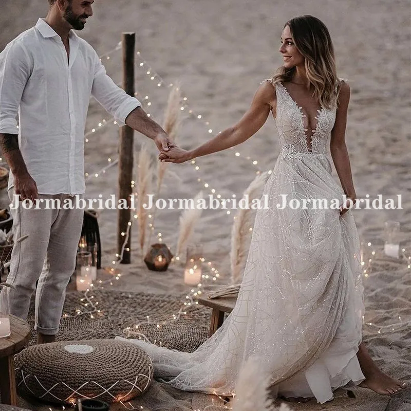 

Ivory Glitter Wedding Dresses Sexy Low V-Neck Shiny Tulle Beach Bridal Dress Boho Wedding Party Gowns Illusion Back Long Train