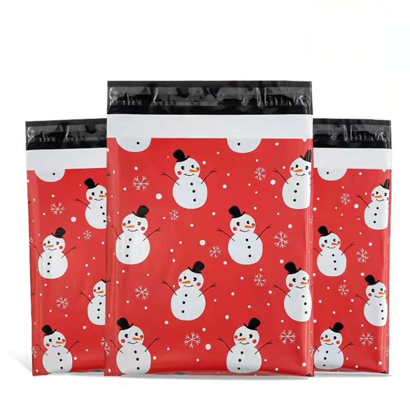 50 unidades/lotes plástico feliz natal saco de correio boneco de neve dos desenhos animados à prova dwaterproof água presentes de festa expresso storagebag mailing plástico packbag