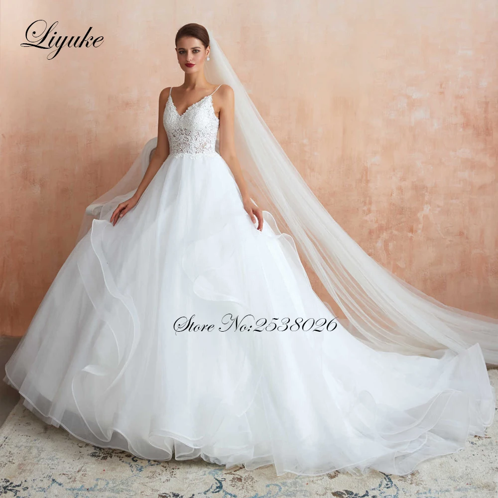 Liyuke Spaghetti Strap  A Line Wedding Dress Simple Lace With With Puffy Skirt Court Train