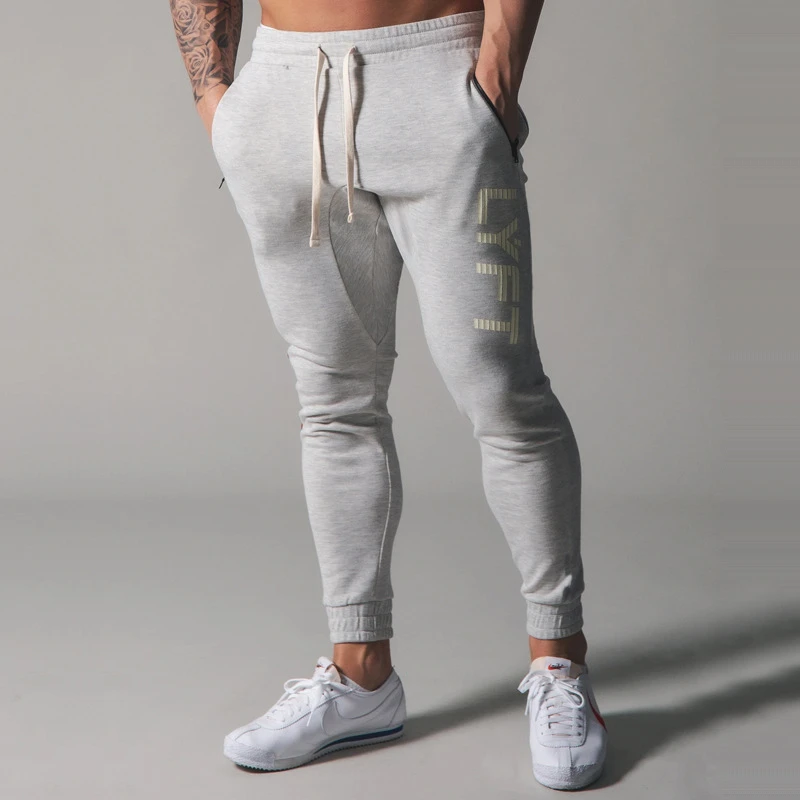 الأنابيب عرق السراويل Sweatpants الذكور التدريب ممارسة القطن جيب سستة رجل رياضة الجري اللياقة البدنية الركض بنطلون تجريب