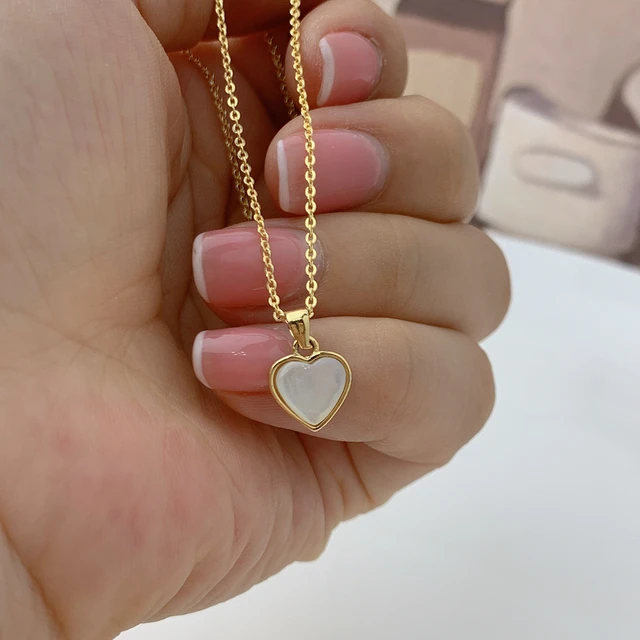 Pendant necklace with charms inside outlet