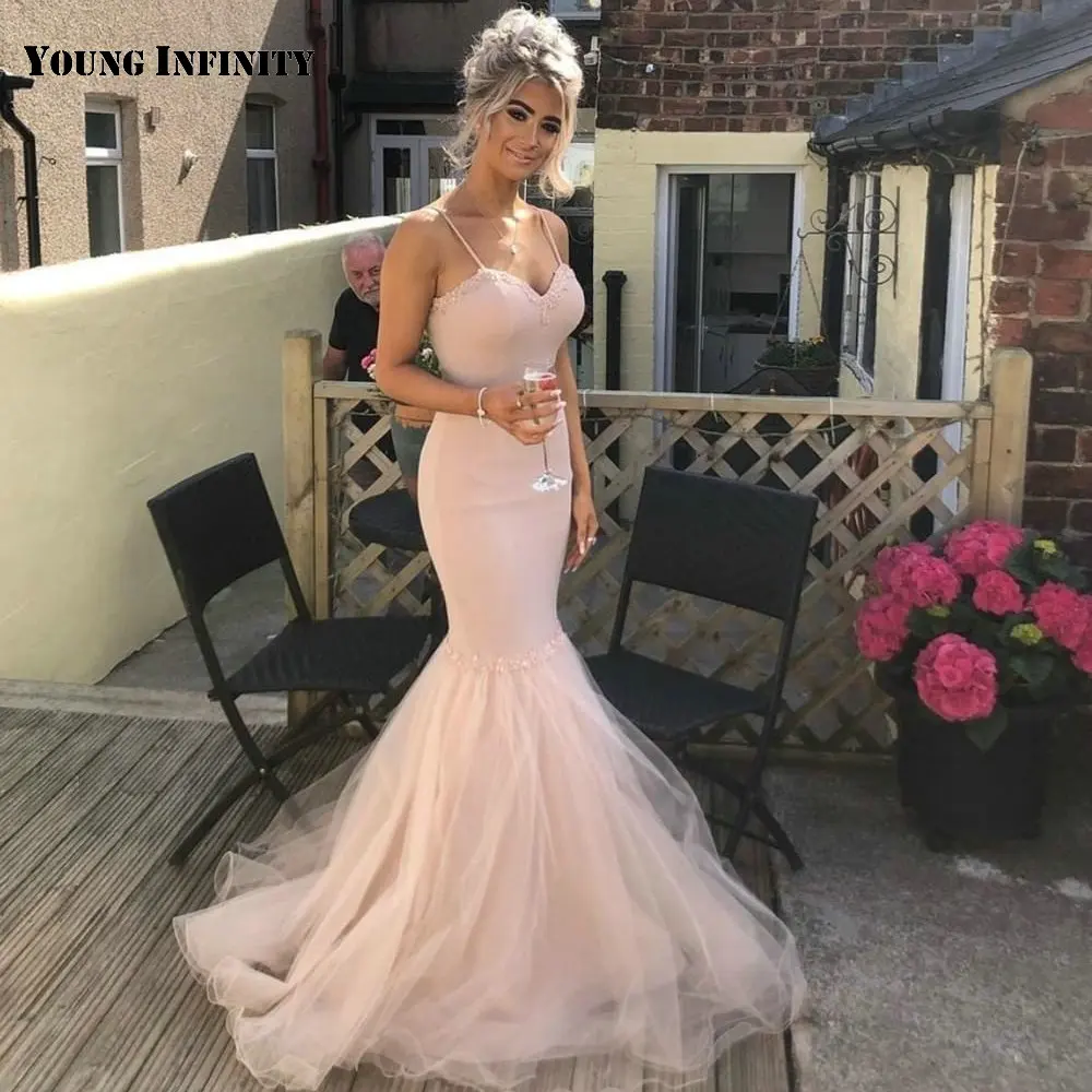 Romantic Light Pink Prom Dress Sweetheart Spaghetti Straps Backless Beading Sweep Train Floor Length Mermaid Party Gown 2021