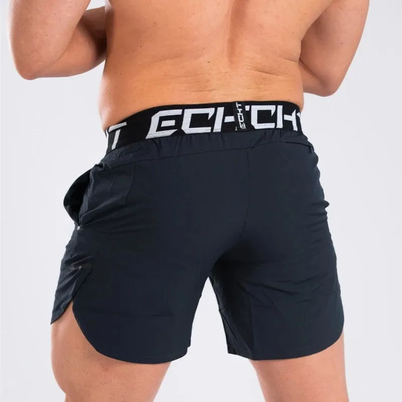 Pantalones cortos de culturismo para hombre, Shorts de gimnasio para Fitness, de secado rápido, finos, informales, para playa, de marca