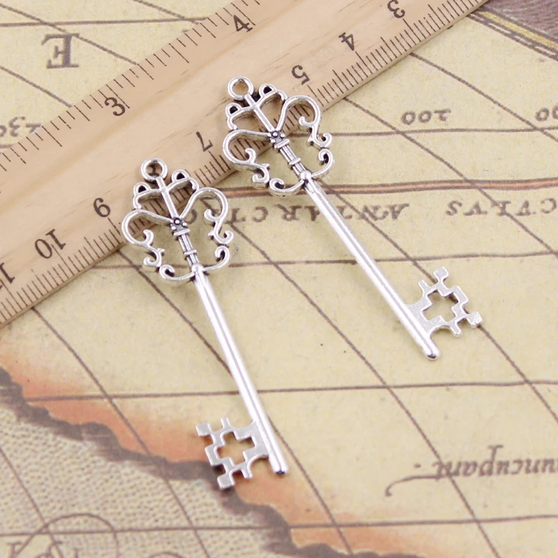 10 sztuk Charms Vintage szkielet klatki piersiowej klucz 58x18mm tybetański brąz srebrny kolor zawieszki antyczne tworzenia biżuterii DIY Handmade Craft wisiorek