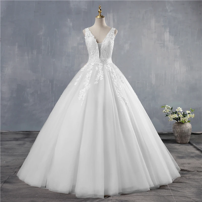 

ZJ9149 V Neck Wedding Dresses 2024 Light Champagne Floor Length Applique Open Back A Line Backless Bridal Gowns