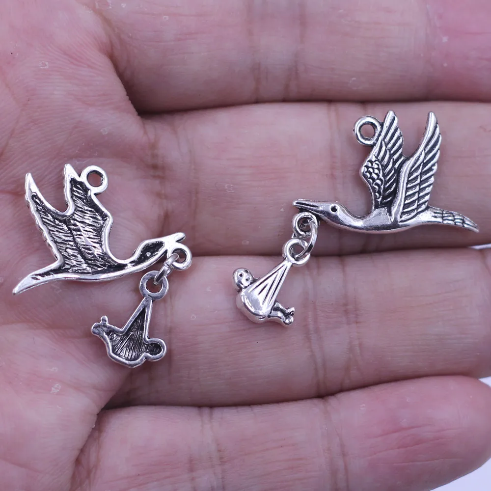 10Pcs Pendants Flying Stork Bird With Dangling Baby Silver Tone Jewelry DIY Findings Charms 17mm