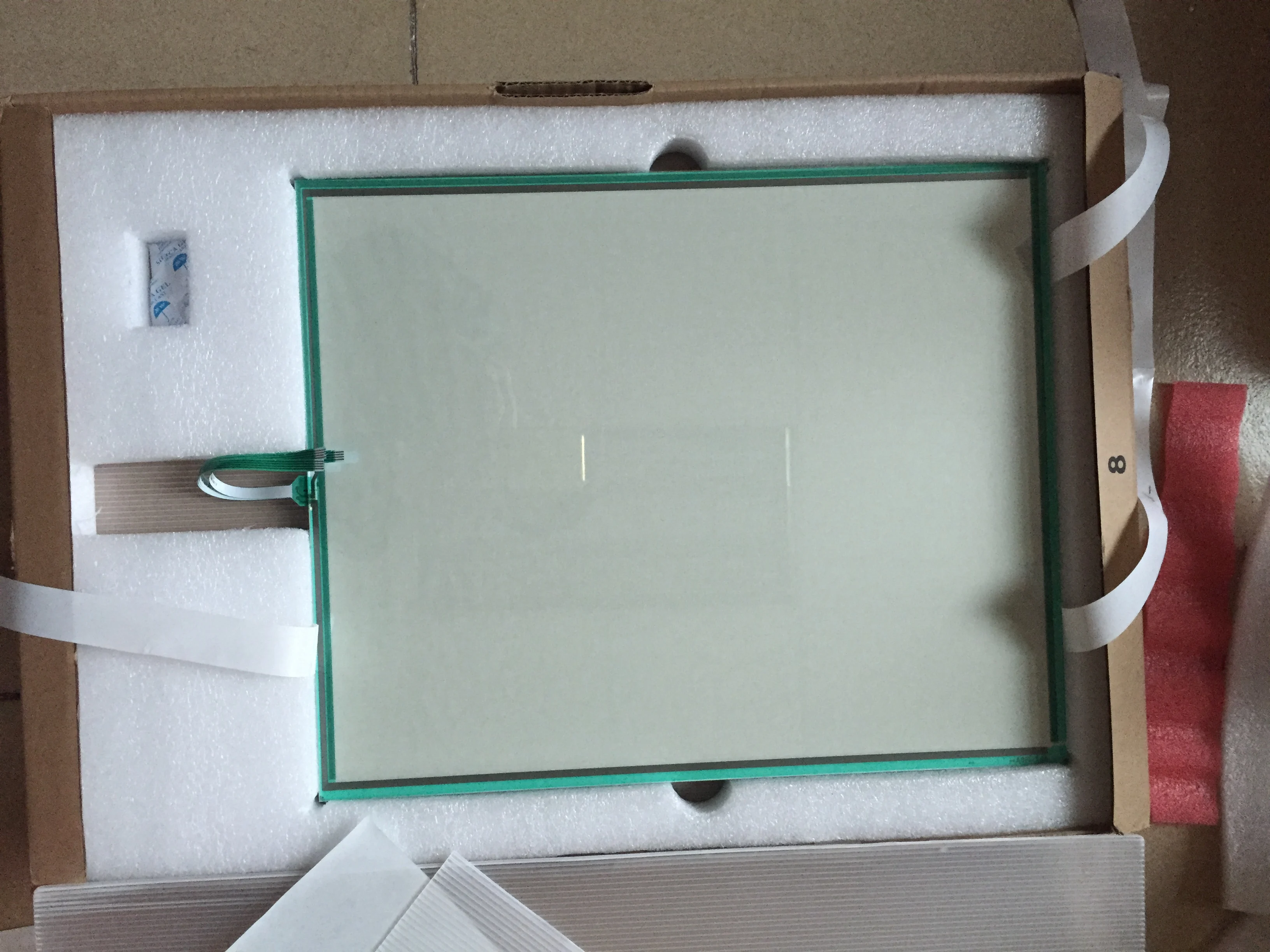 

AST190A new and original (made in Japan) touch glass