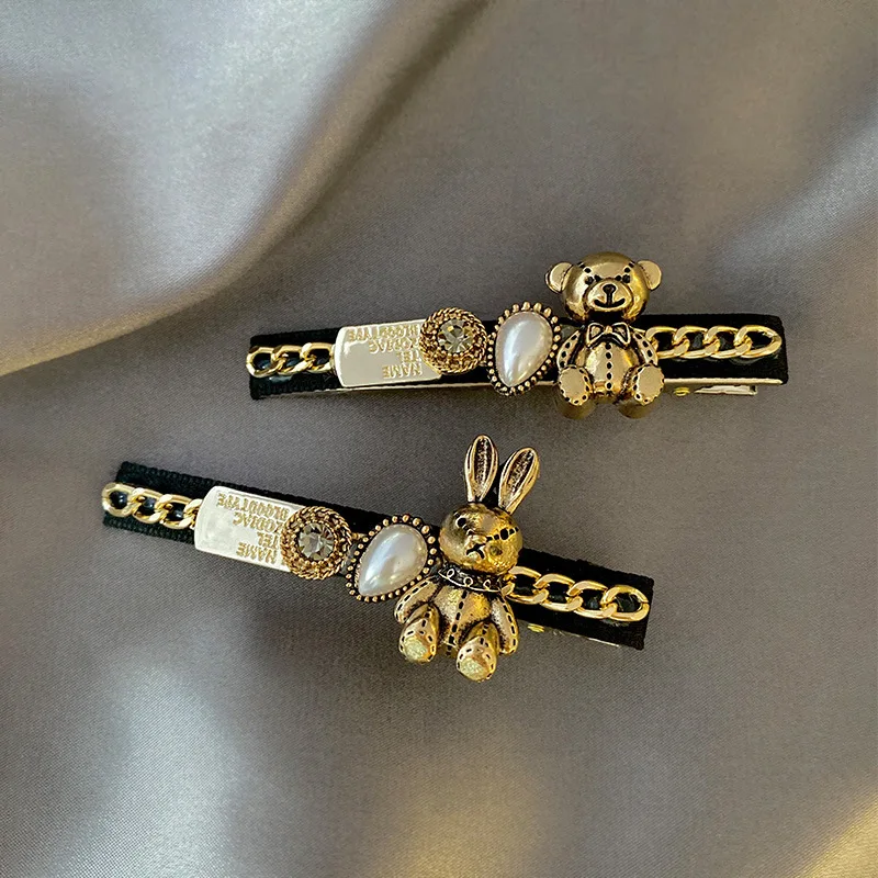 Vintage Metal Pearl kobiety spinka do włosów Barrettes moda złoty stop niedźwiedź Rhinestone kwiatowa do włosów akcesoria szpilka Barrettes