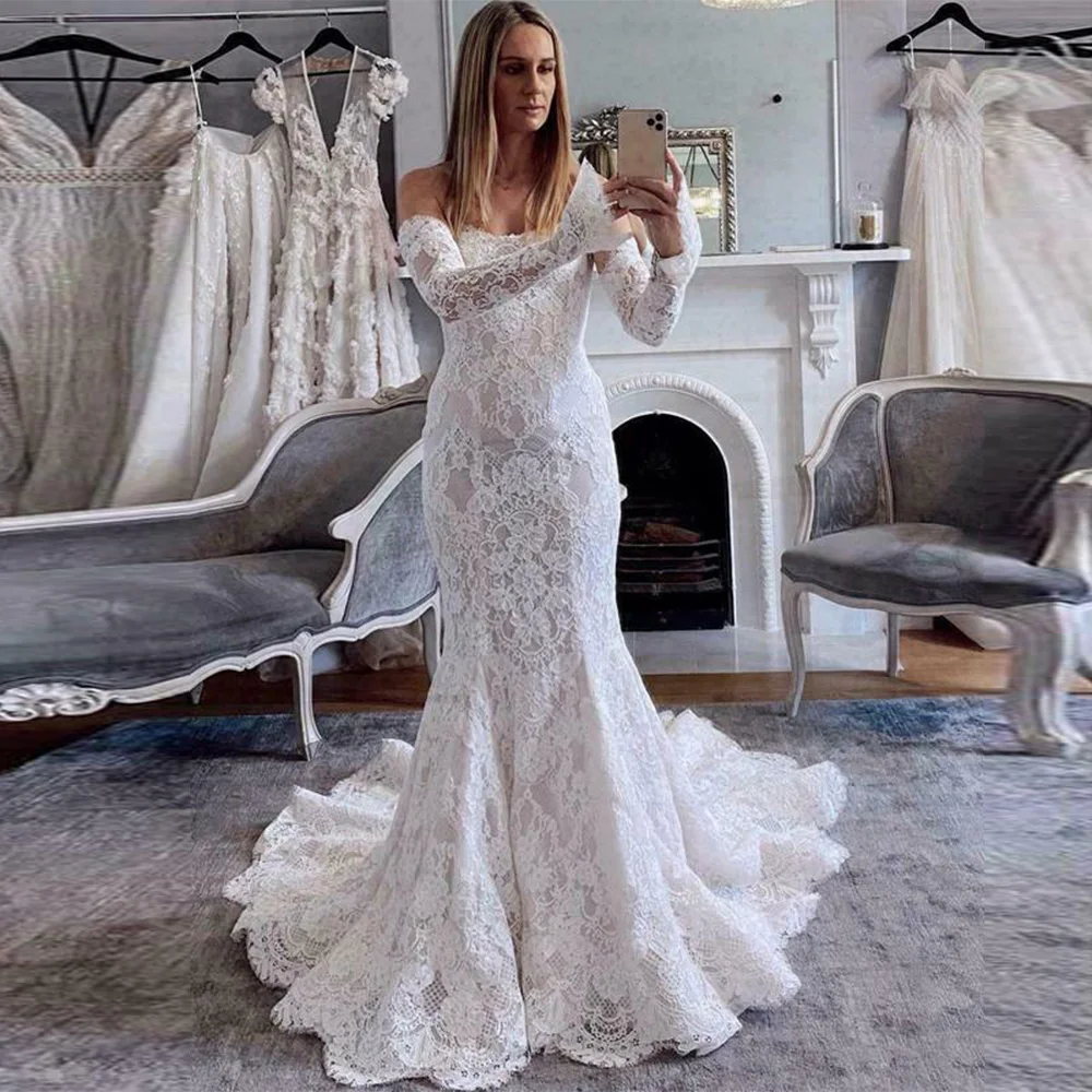 Robe de mariée sirène en dentelle, élégante, col rond, manches longues, dos nu, balayage avec traîne