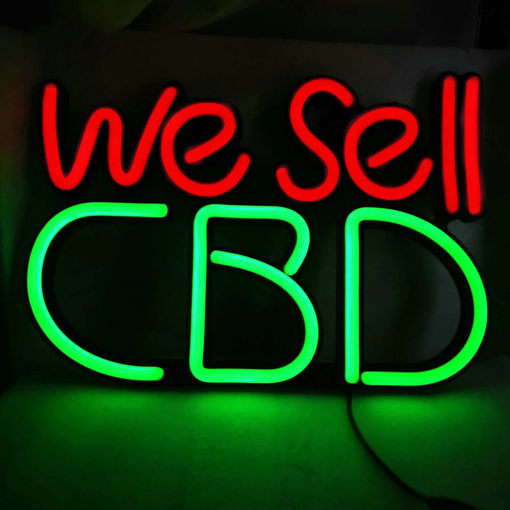 

Wholesale Neon Sign 16 x 11 inches "We Sell CBD" Led Neon Sign LED Neon Decorative Light With Metal Chain Hooks and Sucker Hangs