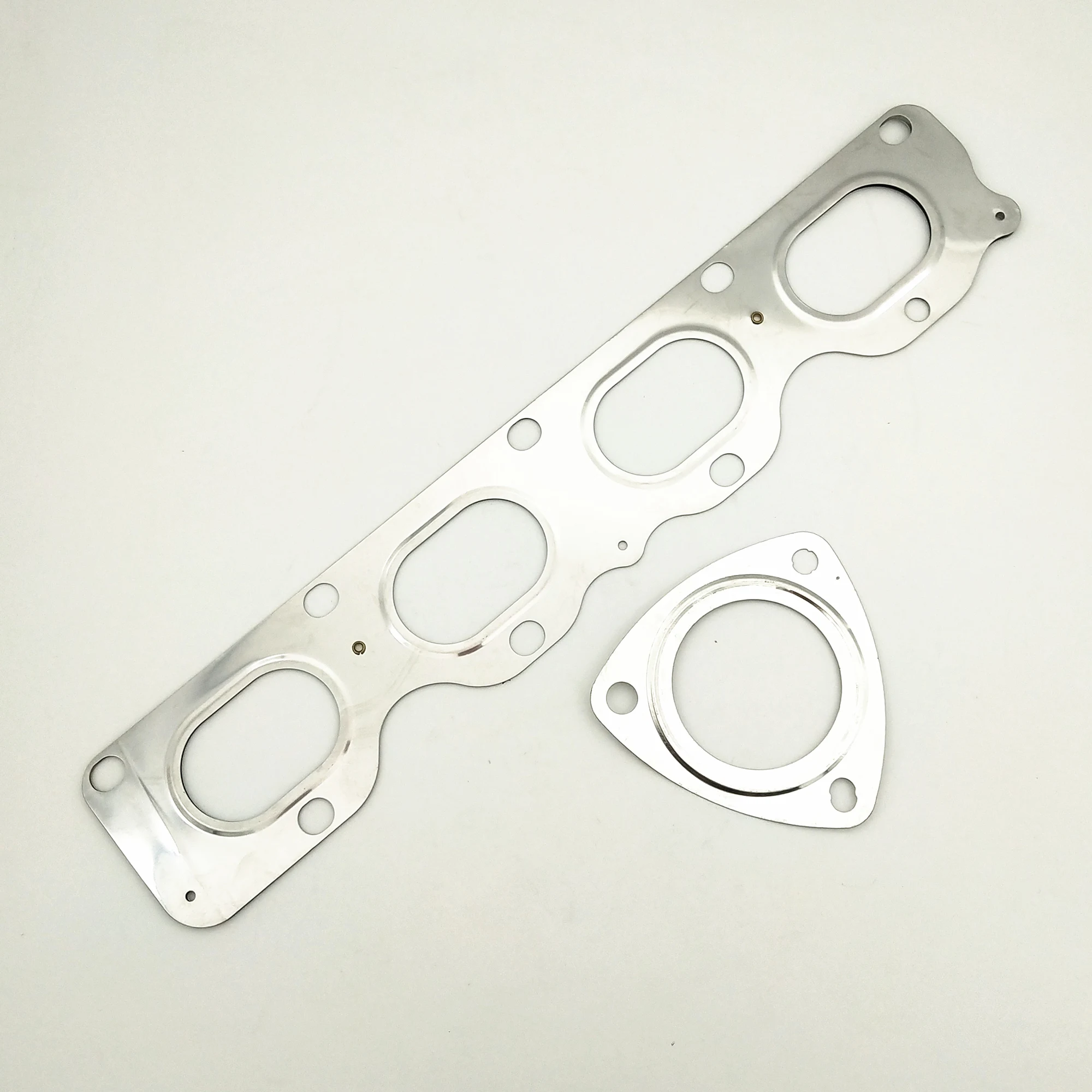 Engine Front Exhaust Pipe Gasket Exhaust Manifold Rebuild Kits For Chevrolet Cruze Sonic Orlando OPEL Astra 12992396 13293986