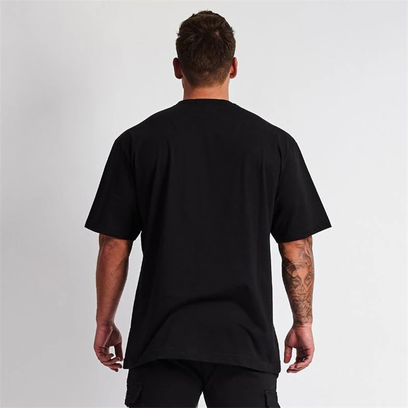 Plain Gym Clothing Fitness Wear Oversized T Shirt Men Hip Hop Sportswear Loose Short Sleeve T-shirt Muscle Bodybuilding Tshirt