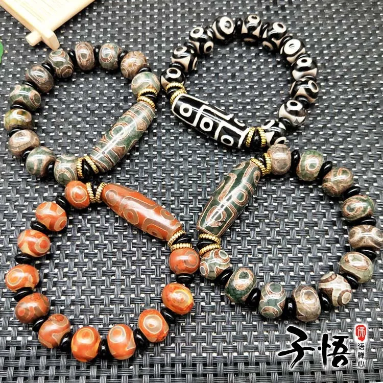 

Factory direct supply of original Tibetan antique green three-eyed Dzi Beads bracelets Old agate black and white nine-eyed