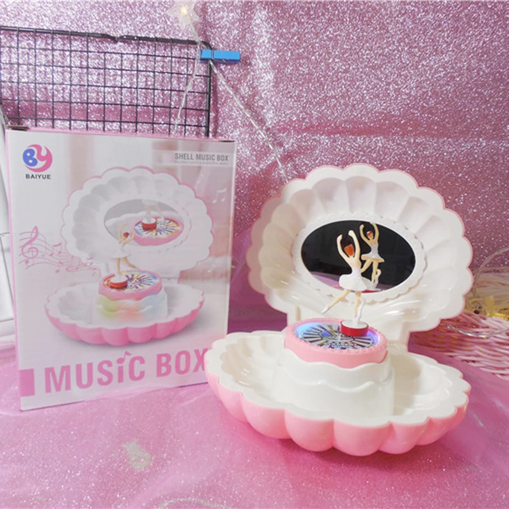 HOT!! Jewelry box Shell Shaped Rotating Girl LED Flashing Music Box Musical Toy Kids Xmas Gift Geometric Music baby room decor