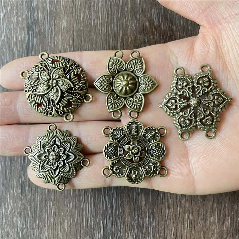 JunKang 10pcs kinds of antique silver flower-shaped hollow bronze dream is catching DIY handmade crafts jewelry connectors