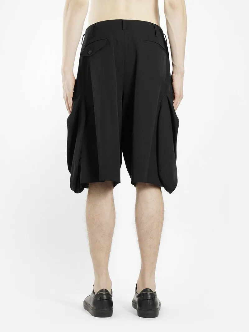 The new summer style men's casual super loose shorts fashion trend three-dimensional big pocket design black bust pants